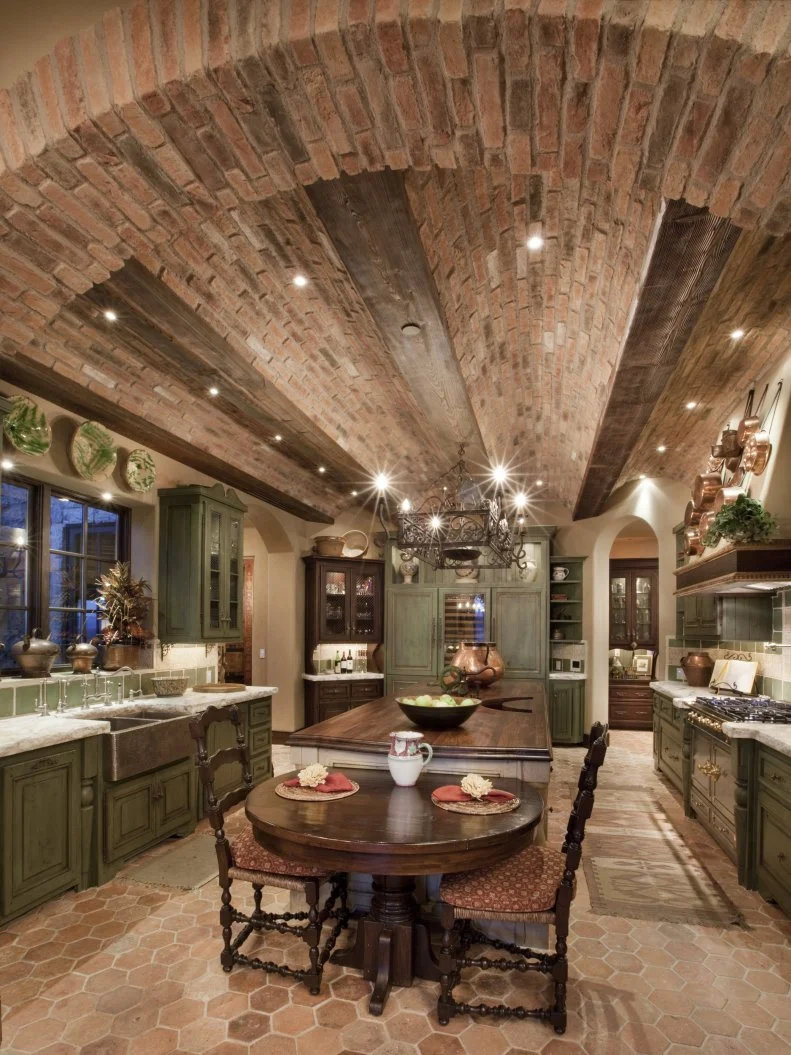 Spacious Old World Kitchen with Curved Brick Ceiling