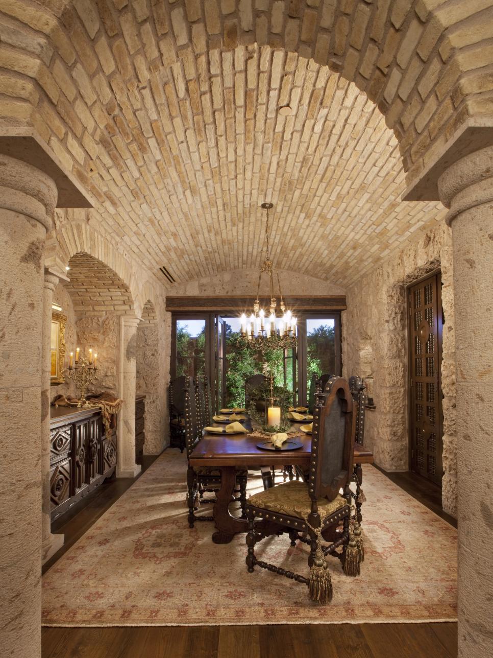 Neutral Dining Room with Barrel Ceiling and Stone Walls