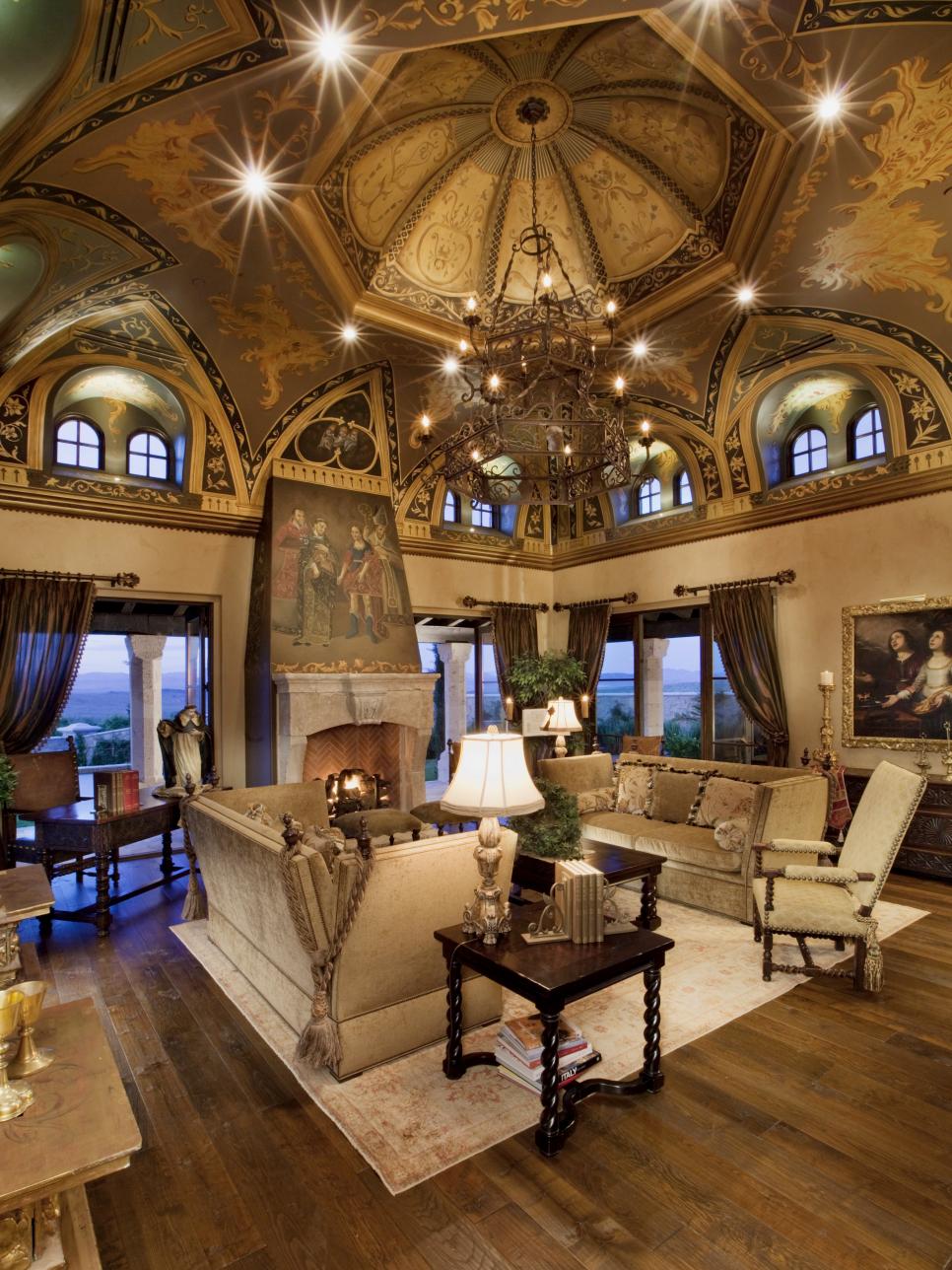 Living Room With Gothic Art Ceiling and Large Chandelier