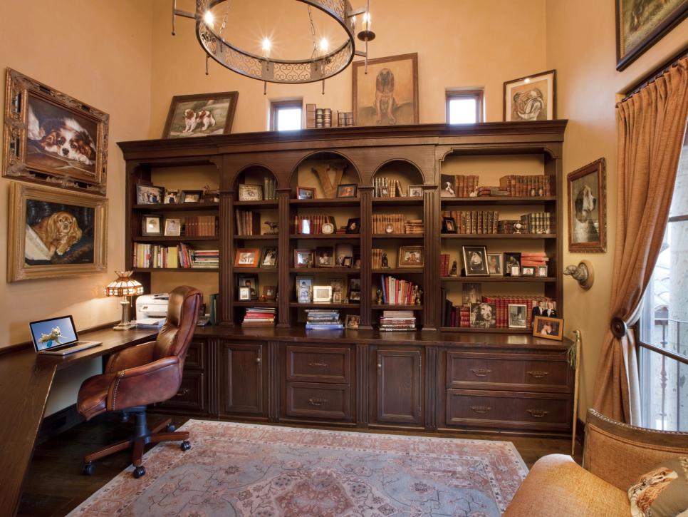 Dog-Themed Home Office and Library With Built-In Wood Shelving