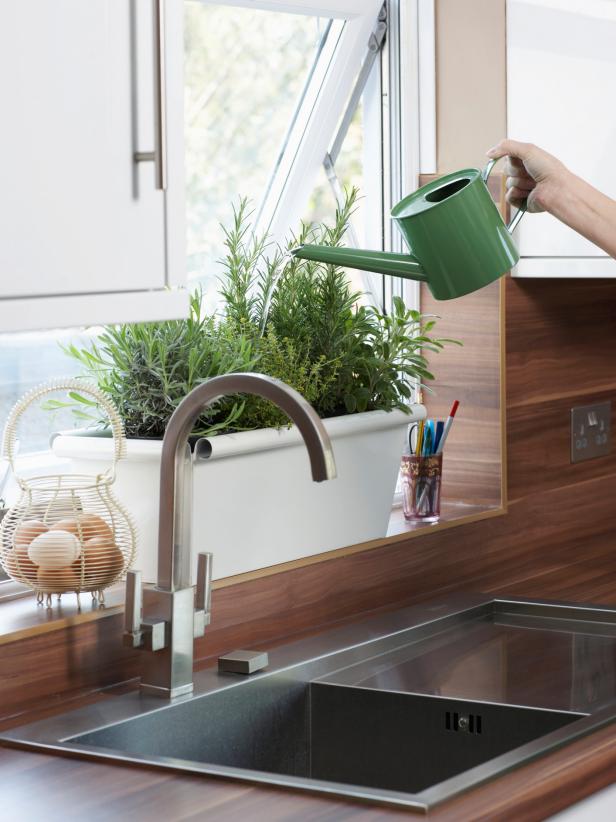 Watering a Kitchen Herb Garden Watering a Kitchen Herb Garden