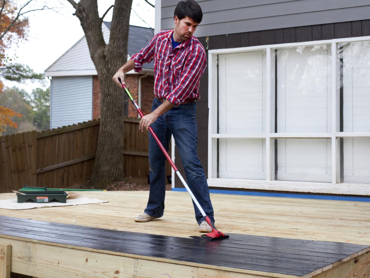 how-to-stain-a-wooden-deck-hgtv