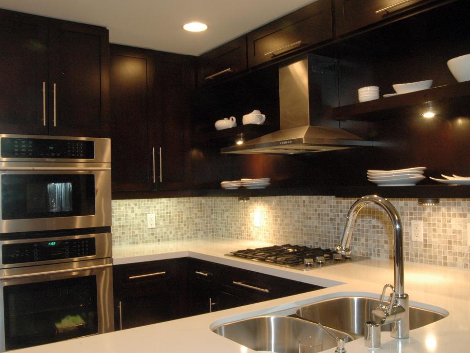 Kitchen with Dark Cabinets and White Countertops 