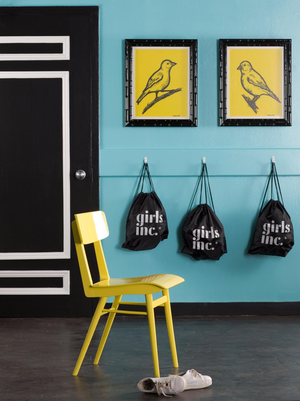 Modern Kids' Room With Coat Hooks and Bird Artwork