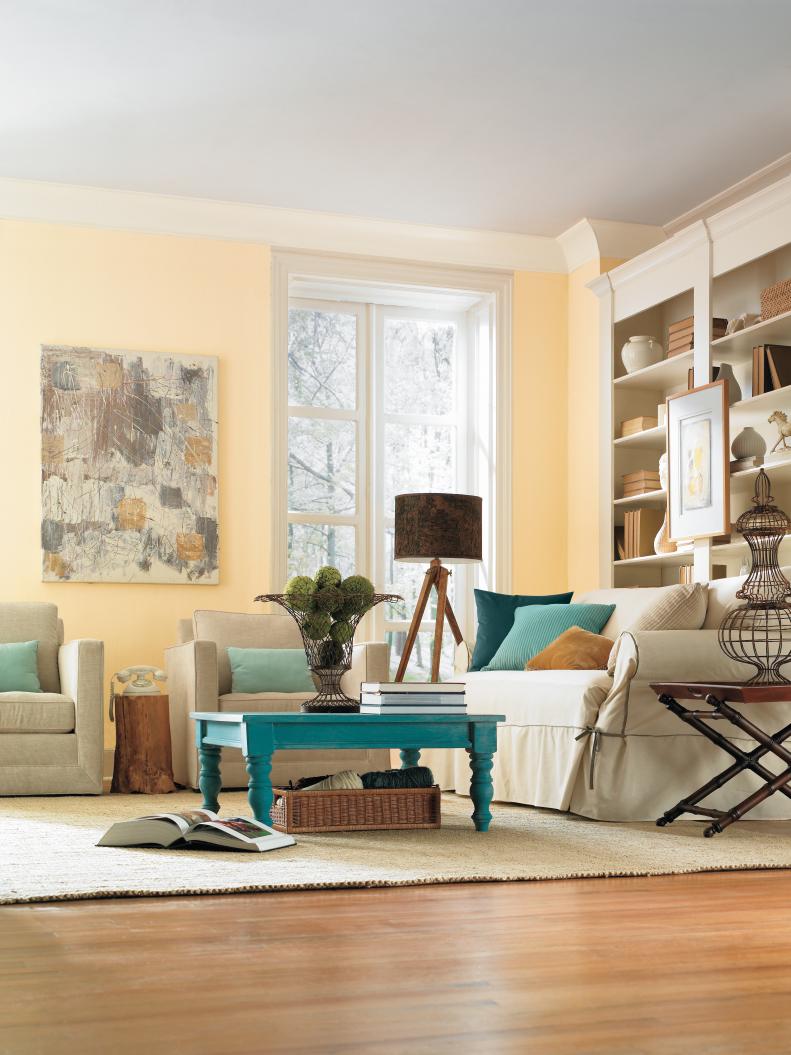 Neutral Living Room With Beige Sofa and Turquoise Coffee Table