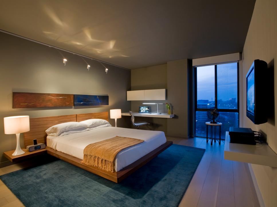 Modern Bedroom With Light Wood Floating Bed, White Bedding & Blue Rug