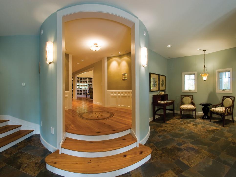 Entryway With Hardwood Floor and White Wainscoting