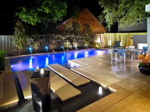 Outdoor Pool with Floating Concrete and Neon Lighting