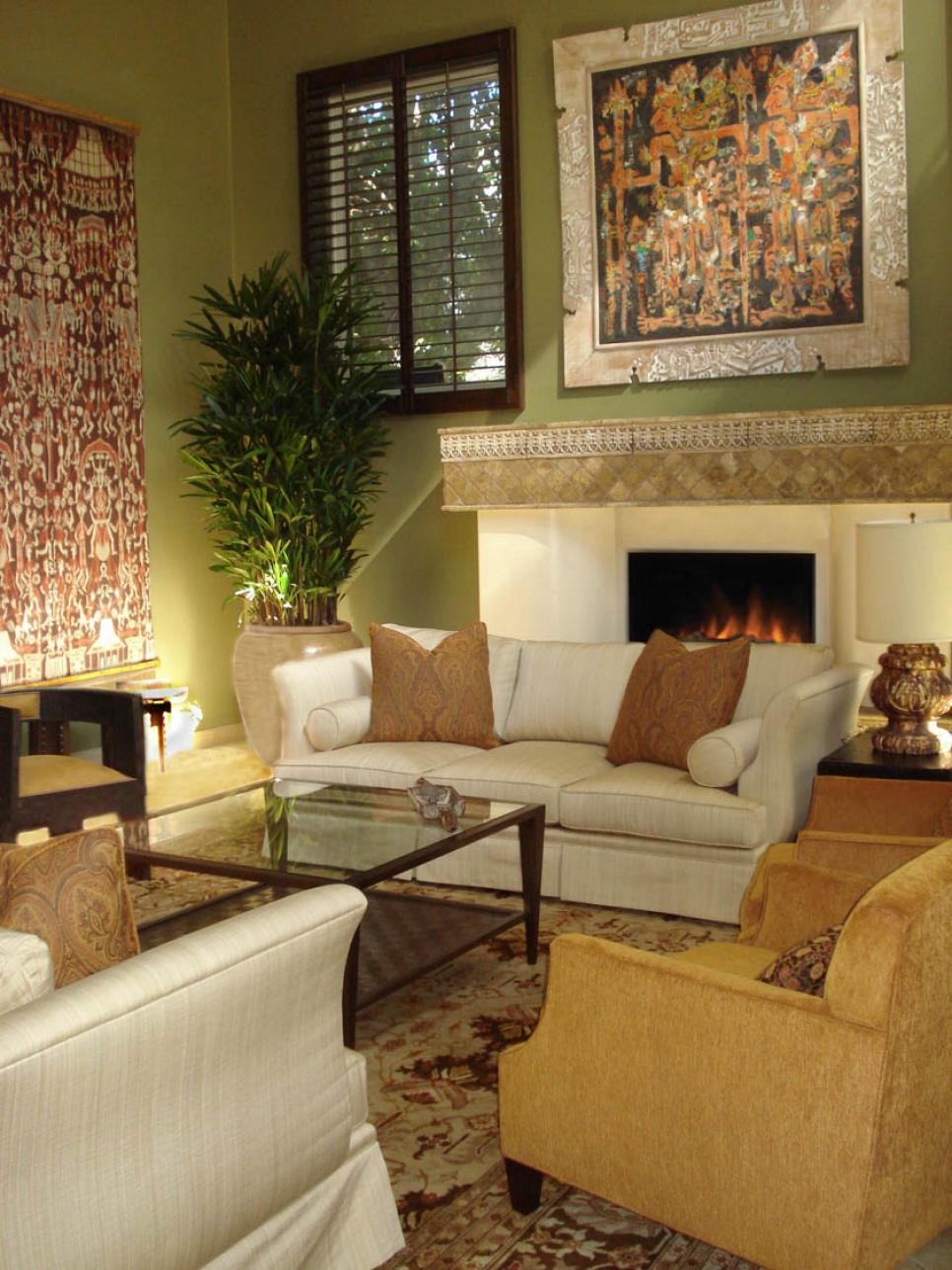 Green Living Room With Beige Fireplace and Sofa