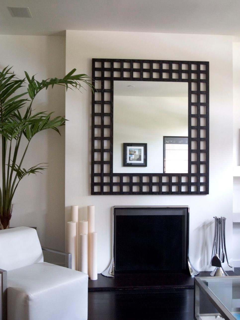 Black Lattice Mirror Above Fireplace in Modern Living Room