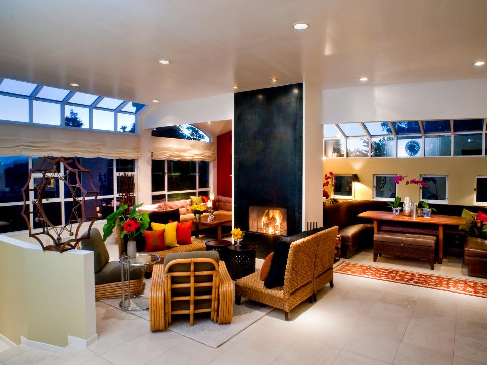 Contemporary Living and Dining Space Separated by a Fireplace 