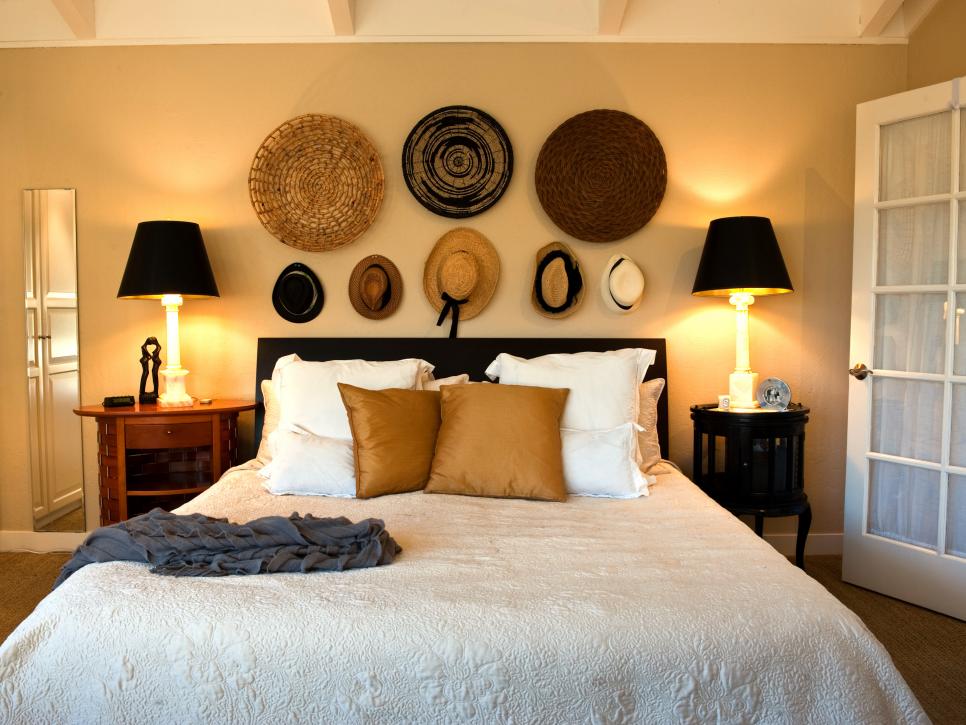 Cottage Bedroom With Straw Hats and Baskets on the Wall