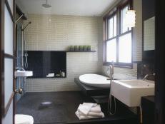 Asian-Inspired Spa Bath With Rain Shower and Freestanding Tub