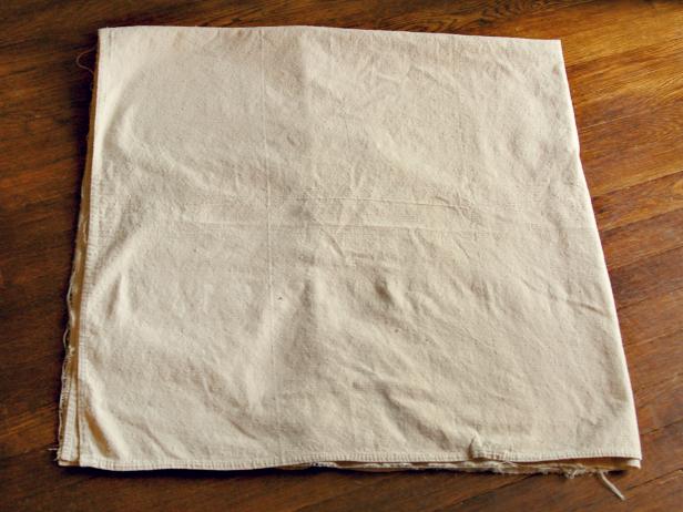 Using a tape measure, mark and cut a square of canvas that is approximately 4-1/2' x 4-1/2'.