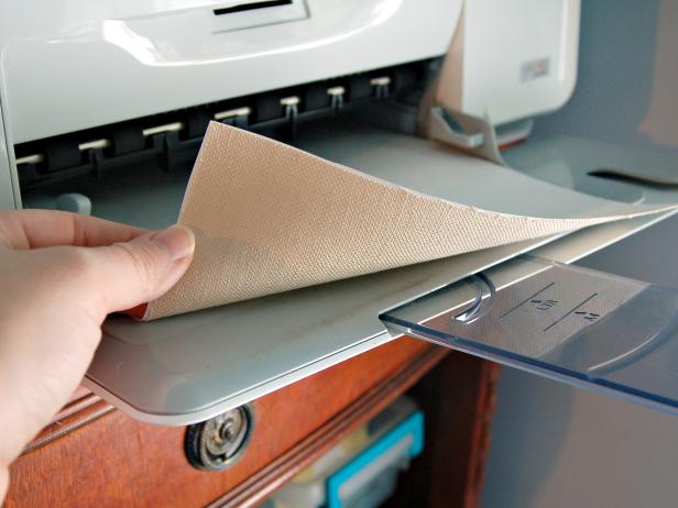 Print each graphic on one page set at 3-1/2" x 5". Place fused linen and freezer paper into an ink jet printer oriented so the graphic will print on the fabric side.