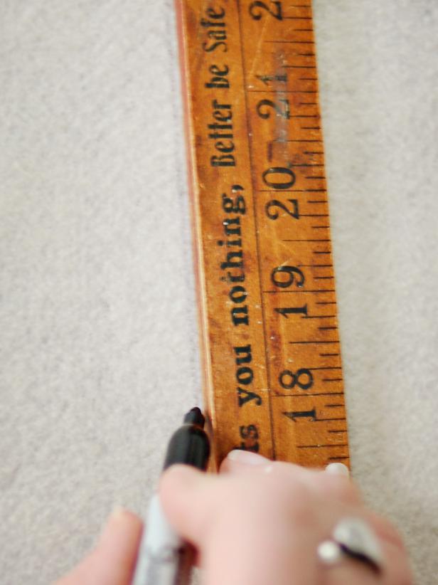 Measure and Cut Cream Felt For Poinsettia Pillow Project Mark Fabric Using Ruler