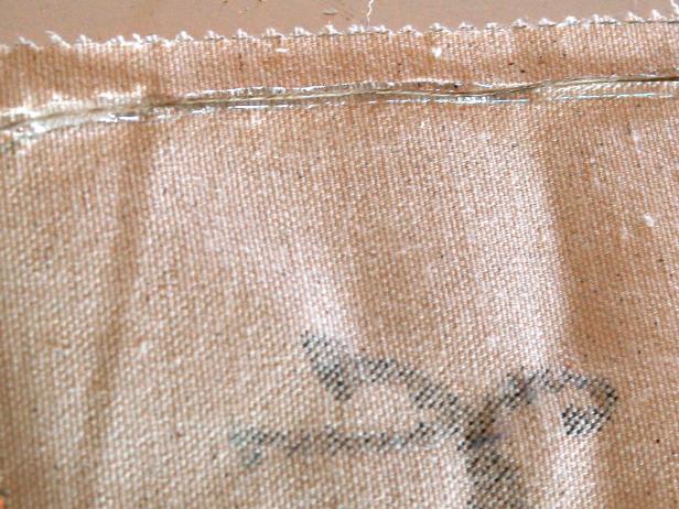 A line of twine creates a border for a vintage-inspired Halloween banner.