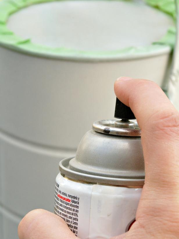 Spray Painting Primer on Treat Bucket Spray Painting Primer on Treat Bucket