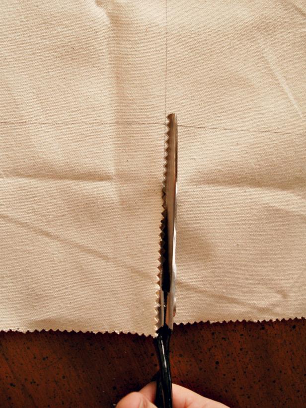 Fabric is cut in preparation for making a vintage-inspired Halloween banner.