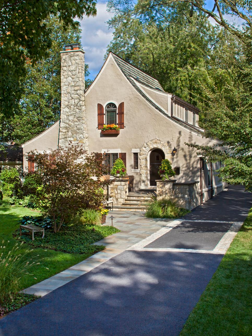 Neutral Stone and Stucco Cottage with Entry Garden and Wood Accents