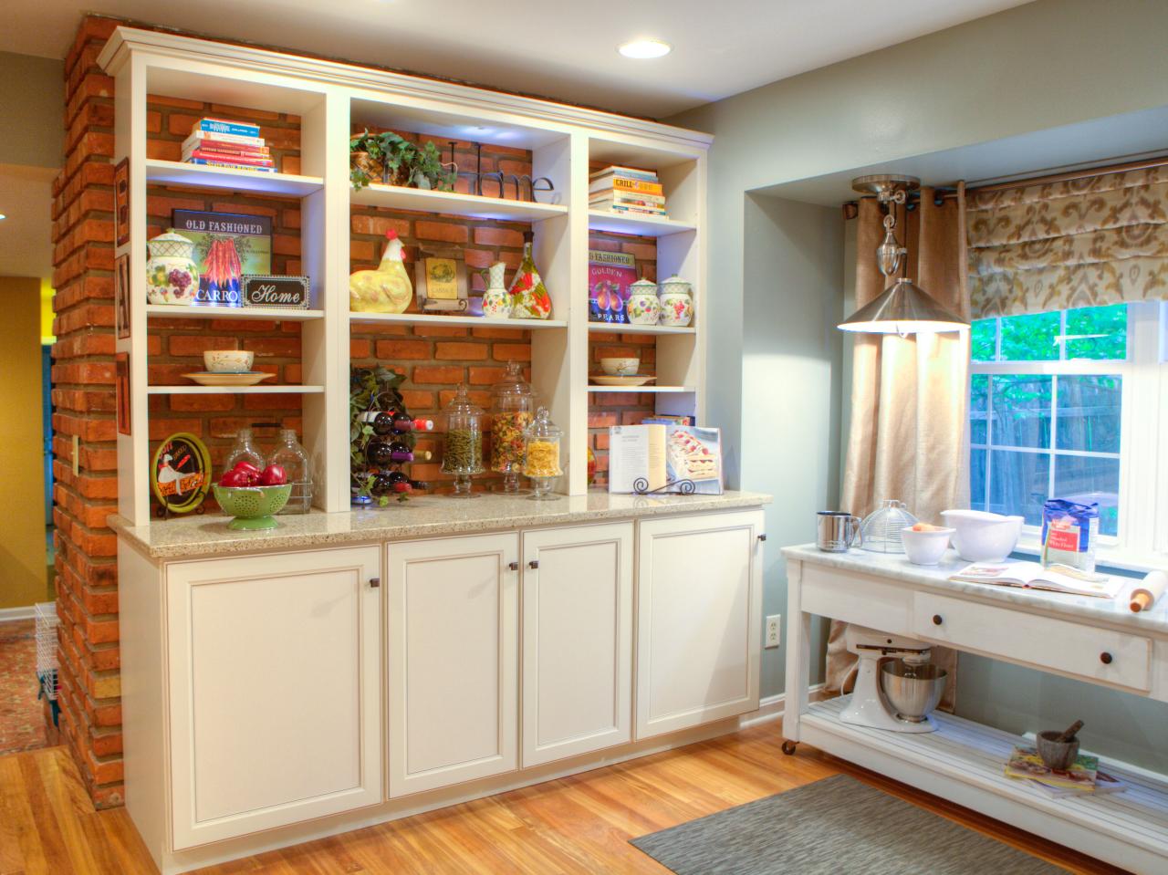 kitchen storage shelves with exposed brick this country style kitchen 