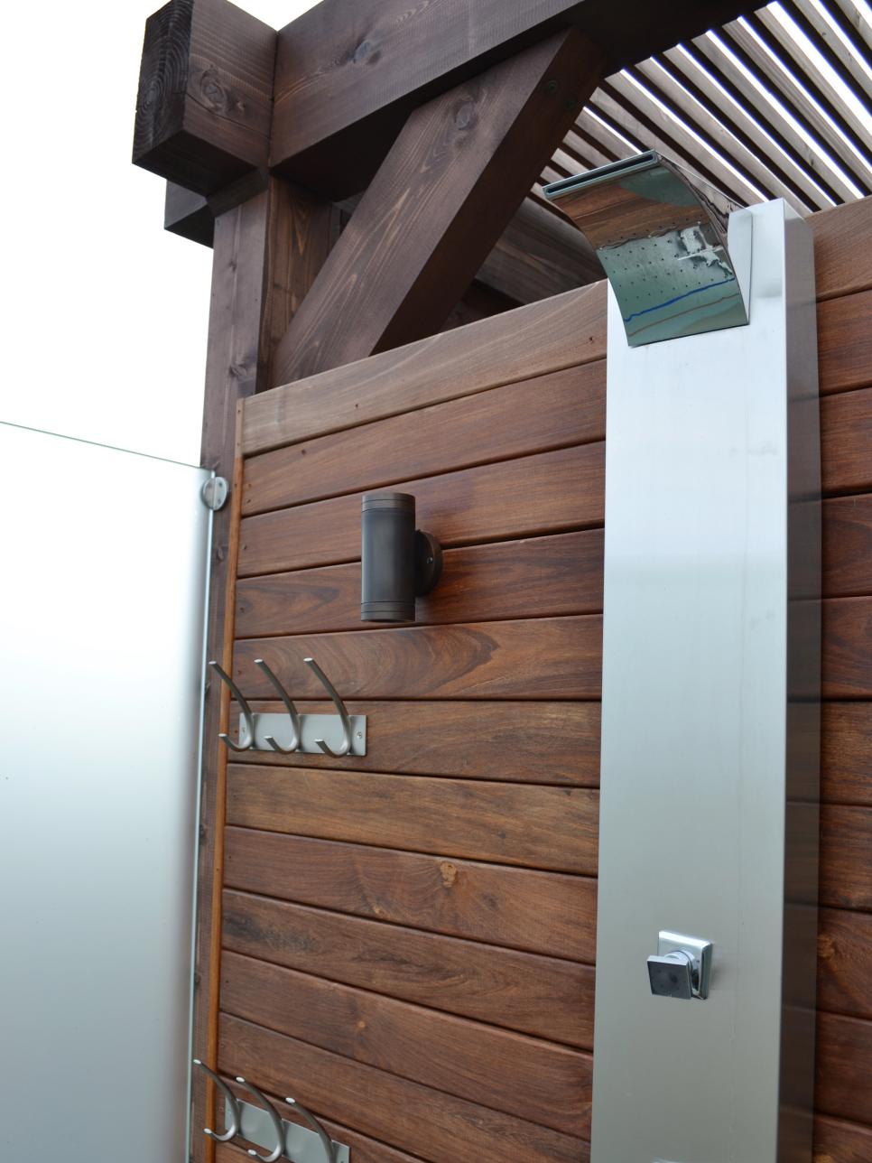 Outdoor Shower With Wood Slats and Stainless Shower Head