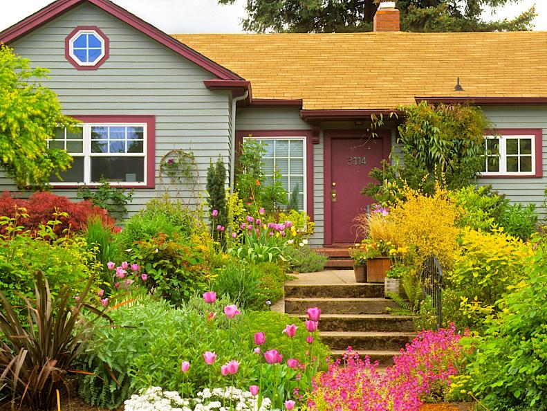 Gray and Burgundy Home Exterior With Layered Entryway Garden