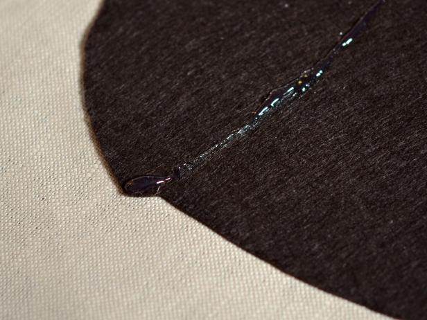 Preheat hot glue gun. Apply bead of hot glue along cap line (Image 1) and immediately stick jute twine to it.