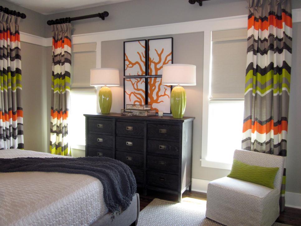 Green and Orange Transitional Bedroom With Funky Striped Curtains 