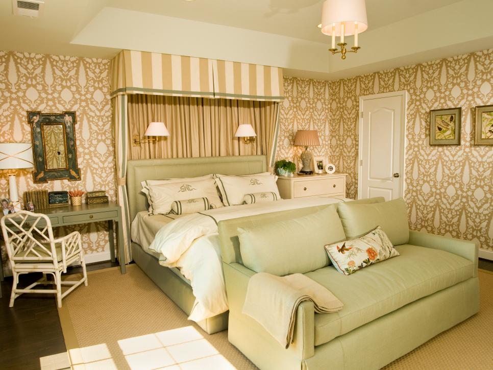 Elegant Contemporary Master Bedroom With Patterned Wallpaper Neutral Bedroom With Cornice Box Over Bed, Green Love Seat