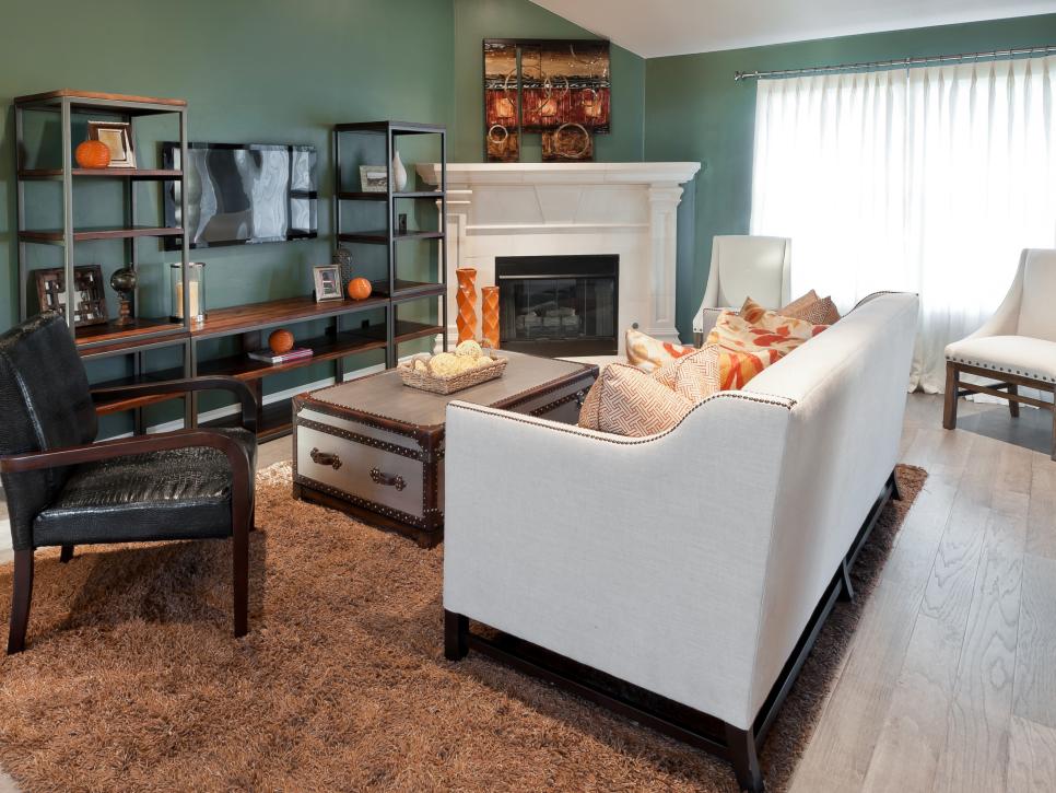 Green Living Room With Vintage Trunk Coffee Table Green Living Room With Industrial Shelving Unit Around Mounted TV