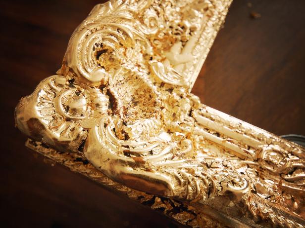 Remove excess gold leaf.