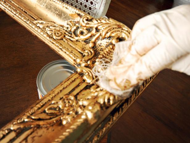 Gently rub off excess with a clean rag. Repeat process around entire frame. Wood stain will stain skin, so wear latex gloves. <b>Tip:</b> Stain will remain tacky for about 24 hours, so allow plenty of dry time after this step.