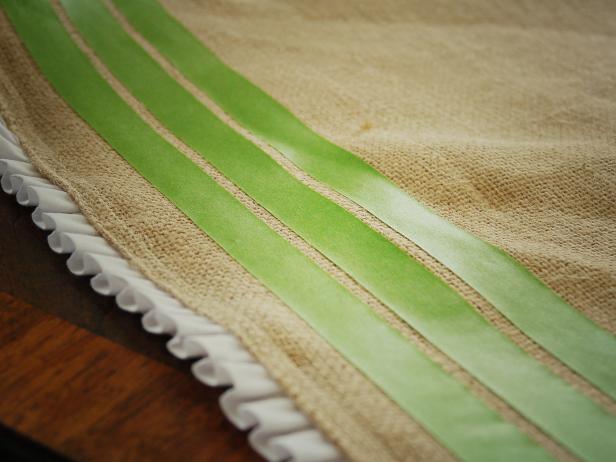 Using painter's tape, mask off two stripes approximately 1/4-inch wide.