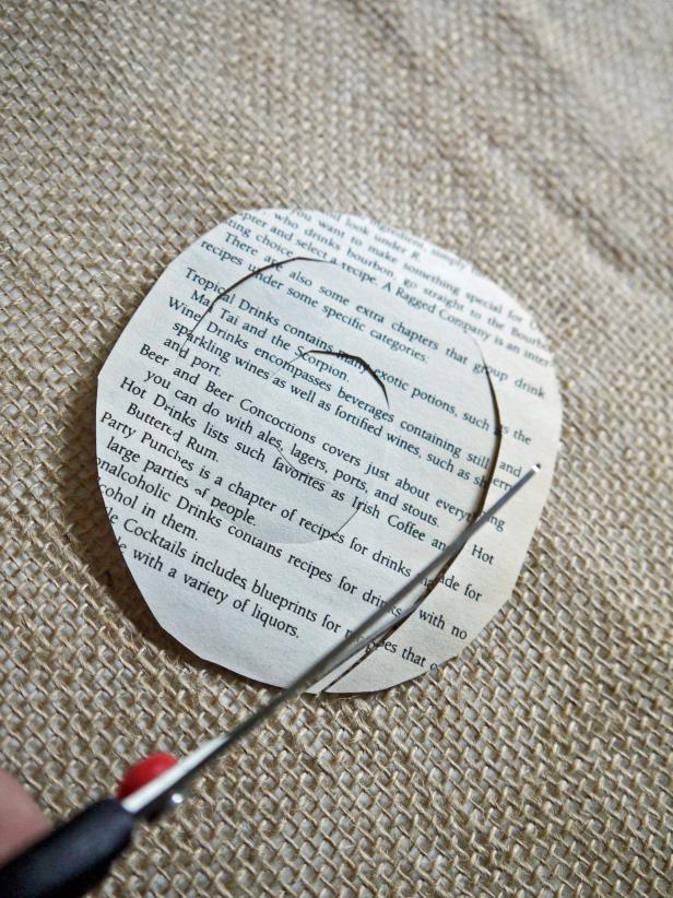 Draw and cut a spiral shape starting from the edges of the circle. Leave a circle in the center; this is where you will affix the rolled flower.
