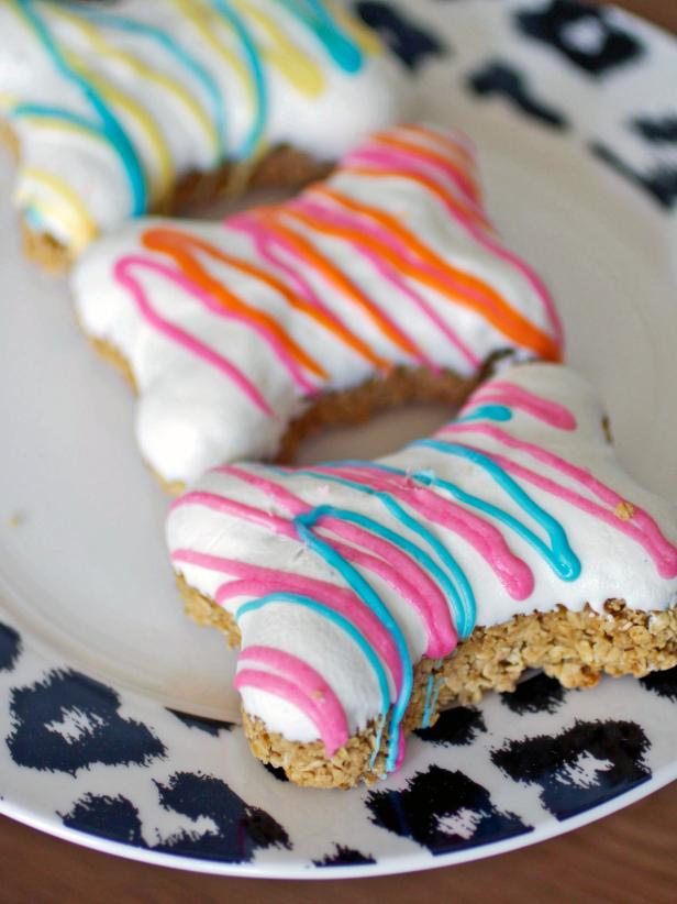 Bone-Shaped Dog Biscuits With Cream Cheese Frosting Bone-Shaped Dog Biscuits With Cream Cheese Frosting