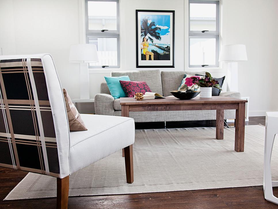 White Contemporary Living Room With Plaid-Backed Chair