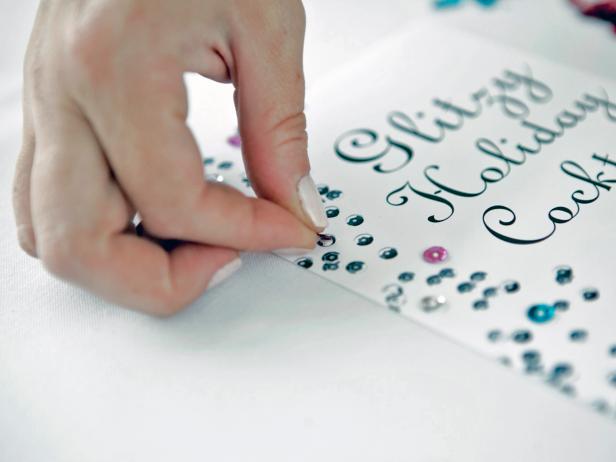 Place dots of tacky glue on the paper where you want to glue individual sequins. Tip: Random patterns look best. Push an individual sequin into each dot of glue. Use a few different colors of sequins. Let dry.