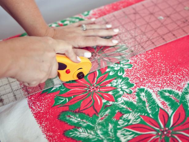 Woman cutting tablecloth