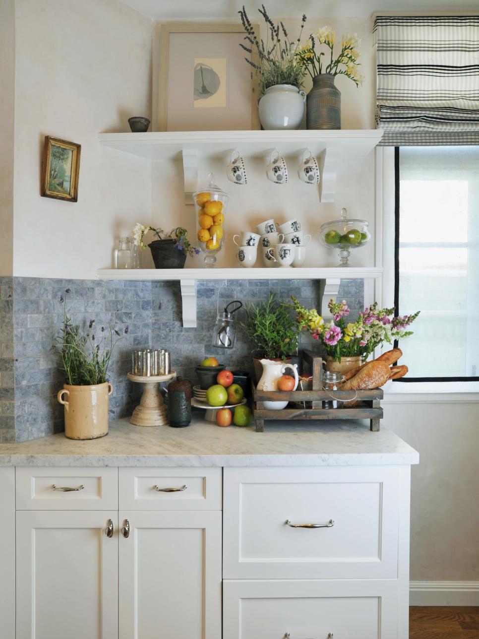 White Eclectic Kitchen With Blue Stone Backsplash and White Shelves