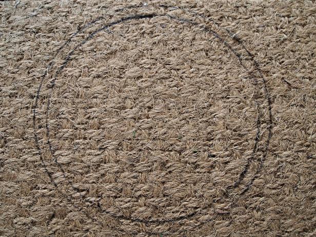 Use the smaller plate or bowl to then trace the inner circle.