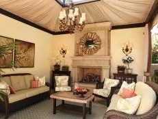 Outdoor Living Room With Wicker Furniture and Skylight