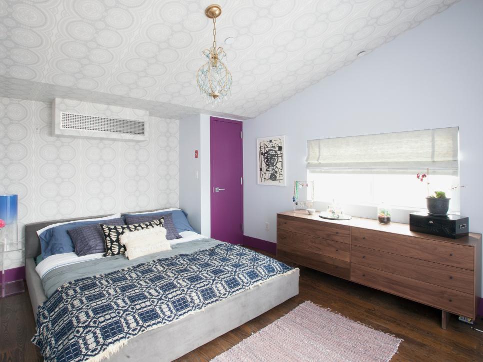 Contemporary Bedroom With Patterned Wallpaper