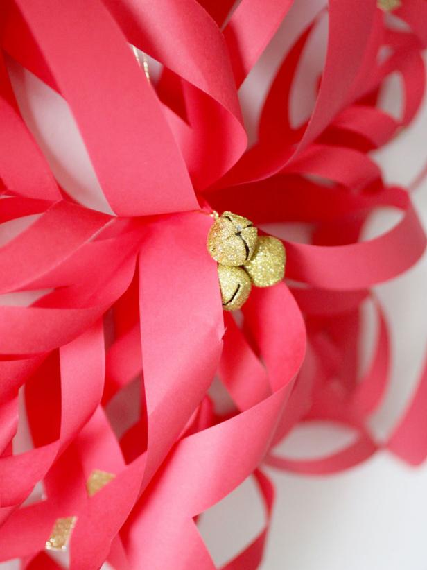 Glitter Bell Accent on Red Paper Snowflake