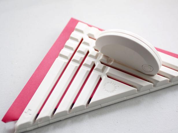 An easy way to cut straight lines in a template is to use a cutting tool.
