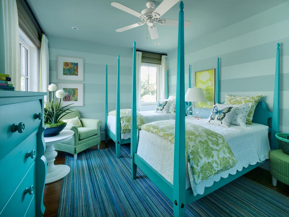 Aqua Bedroom With Twin Poster Beds and Striped Walls
