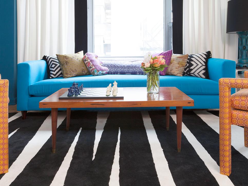 Blue Eclectic Living Space With Black and White Accents