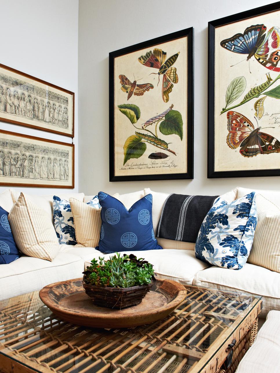 Tropical Sitting Area With Neutral Sectional and Framed Botanical Prints