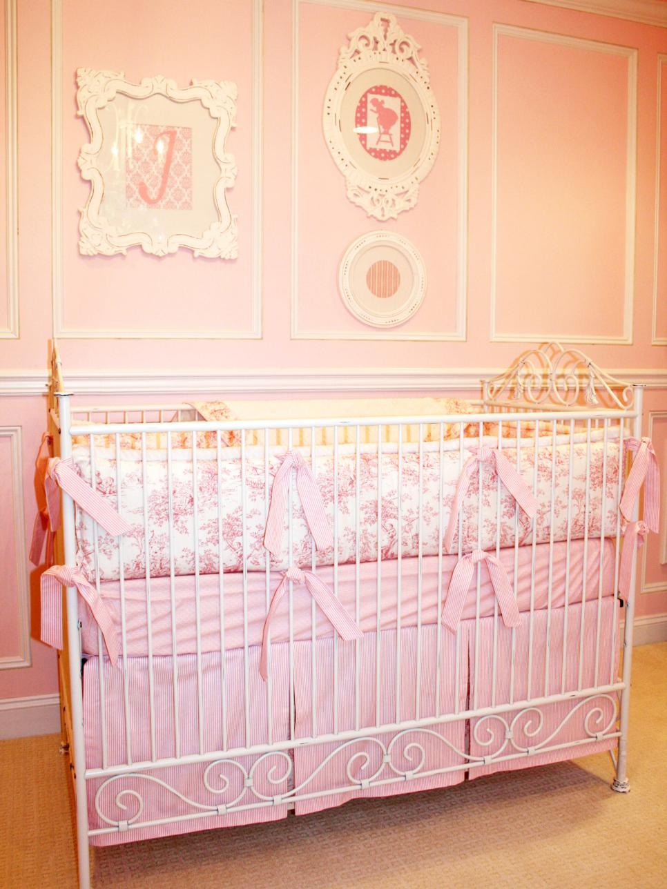 Traditional Pink Baby's Room With White Accents