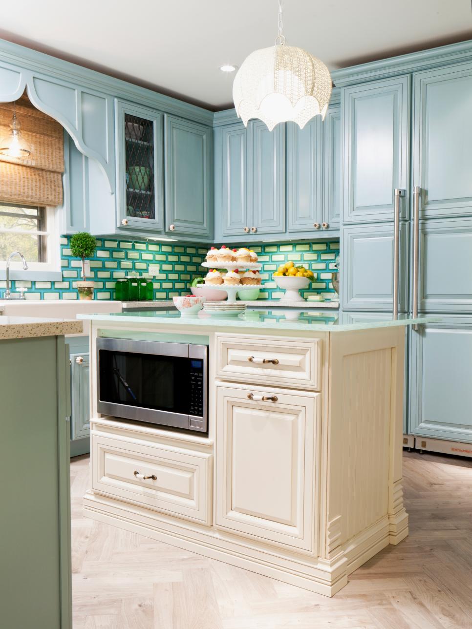 Transitional Kitchen with Blue Cabinets and White Island